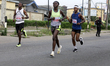 Runners approach GRA, Ikeja, during the 10-kilometer Capital City Race 2024 in Ikeja, Lago...