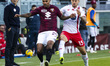 Valentino Lazaro and Pedro Pereira are in action during the Serie A match between Torino F...