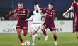 Virgiliu Postolachi, Alin Fica, and Tobias Christensen play during the match between CFR 1...