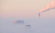 High-rise buildings are seen through the dense fog in Kyiv, Ukraine, on November 25, 2024....