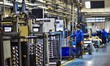 A worker works at an auto parts manufacturing enterprise in the Economic Development Zone...