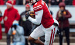 Wisconsin Badgers wide receiver Vinny Anthony II #8 returns a kickoff against the Minnesot...