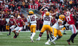 Minnesota quarterback Max Brosmer #16 throws a pass against the Wisconsin Badgers at Camp...