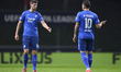 Anton Stach of TSG 1899 Hoffenheim talks with Mergim Berisha of TSG 1899 Hoffenheim during...