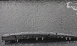 Ice covers the windshield of a vehicle as freezing rain causes surfaces to be coated with...