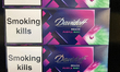 Cartons of cigarettes are at a duty-free shop at Zayed International Airport in Abu Dhabi,...