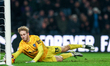 #13, goalkeeper Nicolas Schmid of Portsmouth prevents a goal during the Sky Bet Championsh...