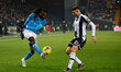 Frank Zambo Anguissa of Napoli plays against Lautaro Giannetti of Udinese during the Itali...