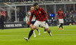 Alvaro Morata plays during the Serie A match between AC Milan and Genoa at Giuseppe Meazza...