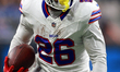 DETROIT,MICHIGAN-DECEMBER 15:  Running back Ty Johnson (26) of the Buffalo Bills carries t...