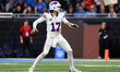 DETROIT,MICHIGAN-DECEMBER 15:  Quarterback Josh Allen (17) of the Buffalo Bills passes the...