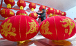A worker dries red lanterns in Handan, China, on December 17, 2024. 