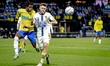 RKC midfielder Chris Lokesa and SC Cambuur Leeuwarden defender Arnau Casas participate in...