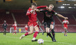 S.L. Benfica Captain Lenny Lacroix puts his arm across Middlesbrough's Ajay Mathews, but n...