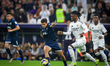 Eduardo Camavinga of Real Madrid battles for possession with Alan Bautista of Pachuca duri...