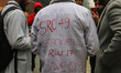 Students participate in a protest outside the chief minister's residence to demand the rat...