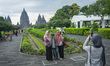 Visitors visit one of the largest Hindu temple sites in the world, Prambanan Temple, a 9th...