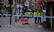 Police cordon on Shaftesbury Avenue in London, England, on December 25, 2024, after a man...