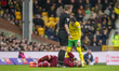 Borja Sainz of Norwich City checks on Paul Nardi of Queens Park Rangers, who goes down wit...
