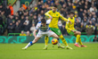 Paul Smyth of Queens Park Rangers is put under pressure by Borja Sainz of Norwich City dur...