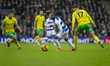 Ante Crnac of Norwich City puts pressure on Kenneth Paal of Queens Park Rangers during the...