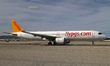 An Airbus A321-251NX from Pegasus company is on the runway ready to take off from Barcelon...