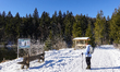 Locals and tourists take a winter walk in Krun, Garmisch-Partenkirchen, Upper Bavaria, Bav...