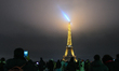 PARIS, FRANCE - DECEMBER 25:   Tourists and visitors at Trocadero Plaza take in the iconi...