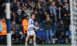 Callum Styles of WBA turns to celebrate with teammates during the Sky Bet Championship mat...