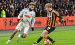Leeds United's Jayden Bogle gets the better of Hull City's Harry Vaughan during the Sky Be...