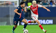 Warren Zaire-Emery of Paris Saint-Germain and Aleksandr Golovin of AS Monaco are in action...