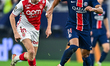 Desire Doue of Paris Saint-Germain and Aleksandr Golovin of AS Monaco are in action during...