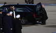 The casket carrying former U.S. President Jimmy Carter is loaded into a hearse at Joint Ba...