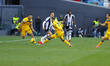 Florian Thauvin of Udinese competes against Sead Kolasinac and Davide Zappacosta of Atalan...