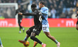 Milan Van Ewijk (27 Coventry City) challenges Djeidi Gassama (41 Sheffield Wednesday) duri...
