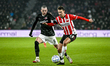 AZ forward Troy Parrott and PSV defender Olivier Boscagli play during the match between PS...