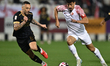 Guilherme Torres (L) of Al Sadd SC and Baghdad Bounedjah (R) of Al Shamal SC are in action...