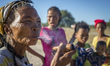 The San woman smoking wooden pipe in the Living Museum of the Ju’Hoansi-San, Grashoek, Nam...