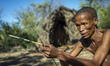 A San man prepares his arrows for hunting in the Living Museum of the Ju’Hoansi-San, Grash...