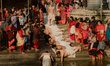 Devotees perform a religious ritual on the first day of Shree Swasthani Brata Katha, a mon...