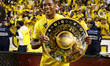 Jonatas Santos of Al Wasl FC celebrates with the trophy after winning the Super Shield of...