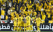 Players of Al Wasl FC celebrate after scoring a goal during the Super Shield of the Qatar-...