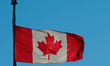 EDMONTON, CANADA - JANUARY 18:  The Canadian National Flag waves under clear, sunny blue...
