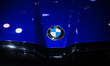 A BMW logo is visible on its vehicle, the M5, which is showcased at the Bharat Mobility Gl...