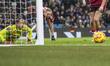 The Manchester United keeper watches the ball go past inches from the goal post during the...