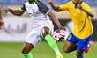 Abdalla Sirelkhatim Yousif (R) of Al-Gharafa SC and Sekou Oumar Yansanei (L) of Al-Ahli SC...