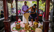 A Hindu priest performs prayers at the Sree Kallely Oorali Appooppan Kavu in Kalleli, Path...