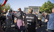 Right-wing activists march in the city center during a demonstration organised under the m...