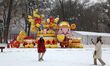 Tourists take photos of the snow at the Mountain Resort in Chengde, China, on January 26,...