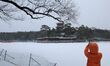 A tourist takes photos of the snow at the Mountain Resort in Chengde, China, on January 26...